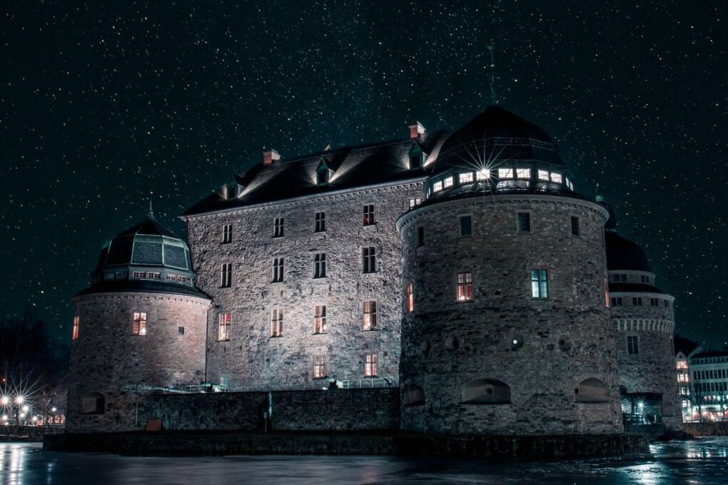 Castle and night sky filled with stars in Örebro City, Sweden