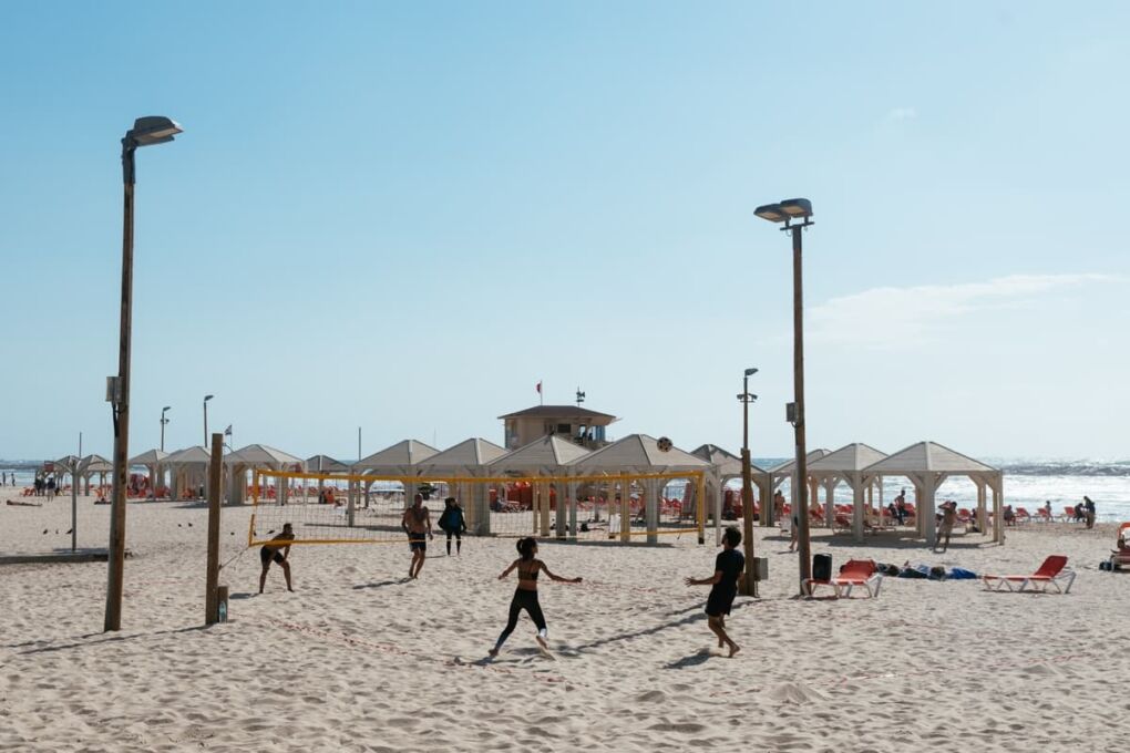 People playing beach volley ball in Tel Aviv