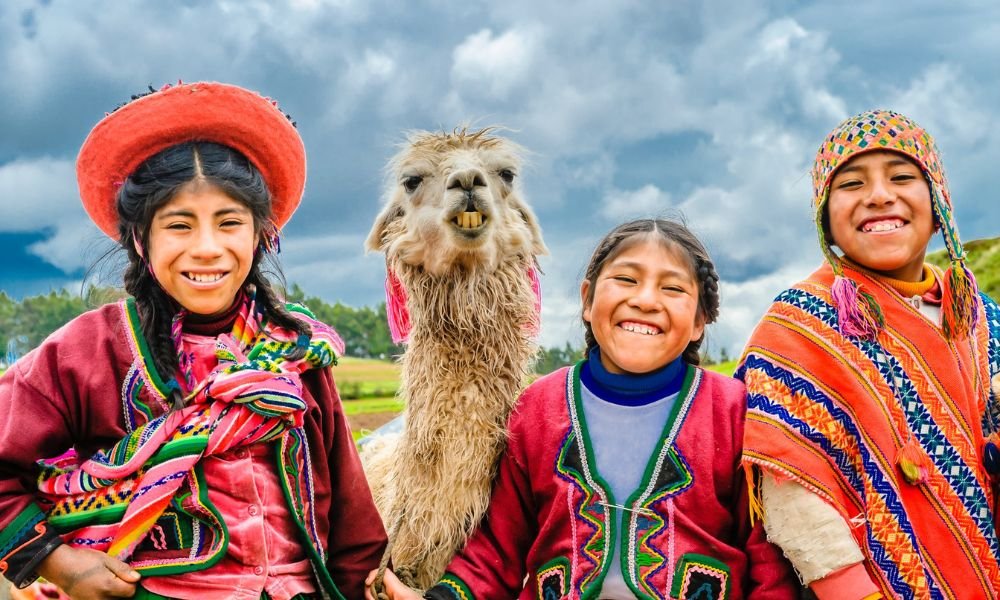 people smiling with llama in South America