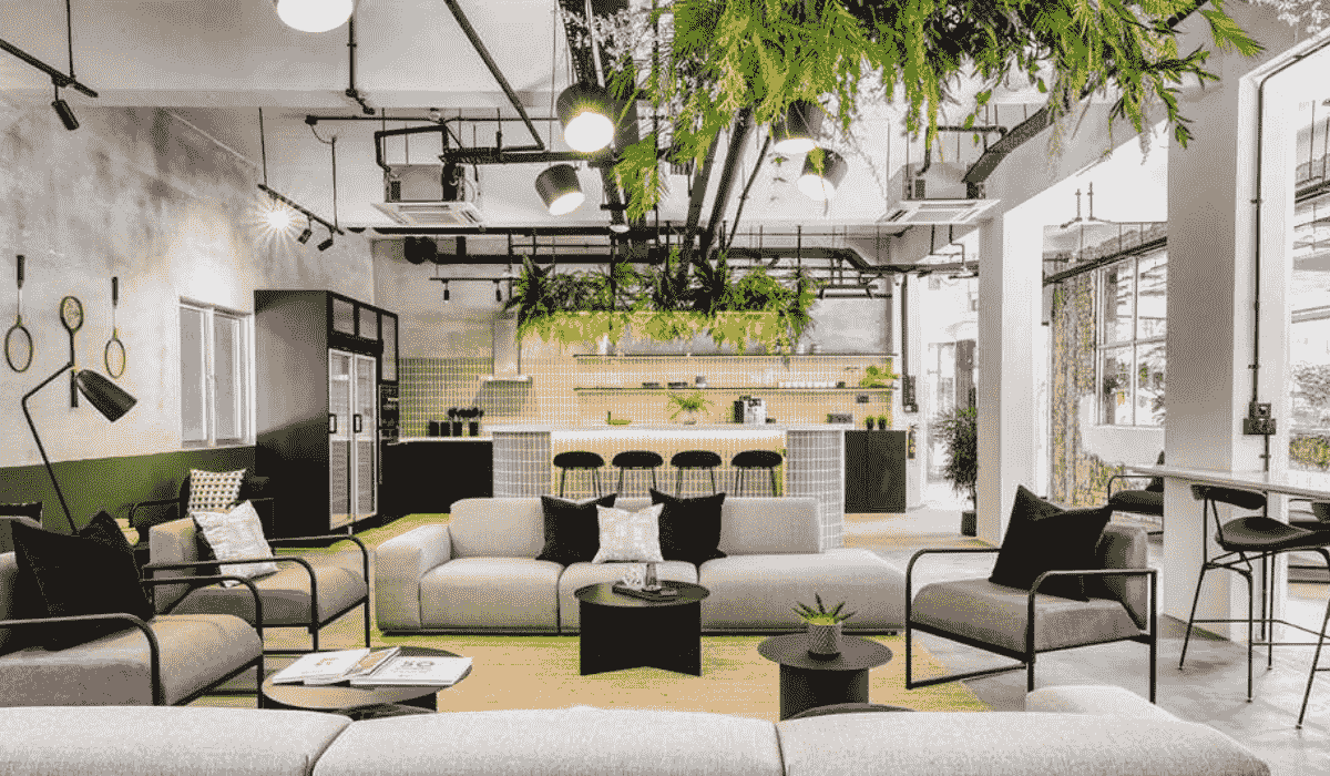 The industrial chic style lobby and coworking space at Hmlet Cantonment in Singapore.