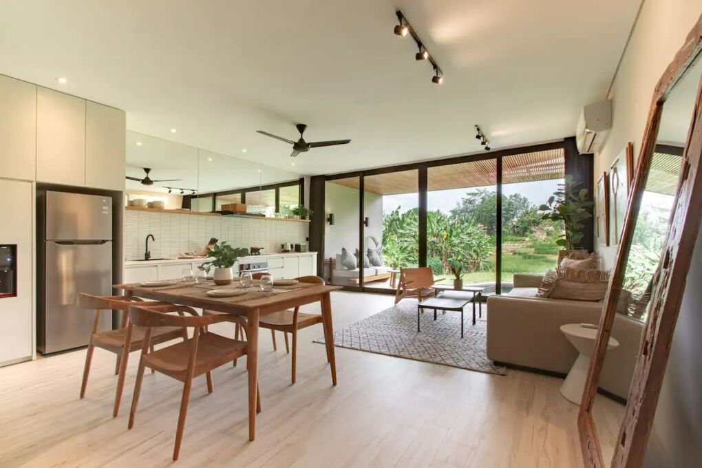 The kitchen and living area at this secluded luxury apartment suitable for remote working in Indonesia