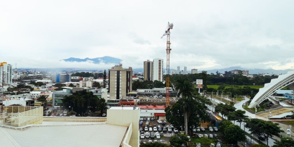 View of San Jose buildings with Volcan Irazú in background 