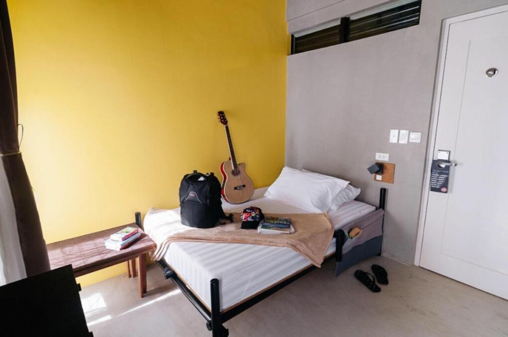 A bedroom at Spin Designer Hostel for coliving and coworking in the Philippines