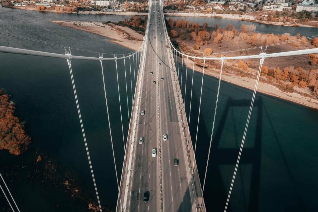 Aerial view of Semey bridge suspended over Irtysh river