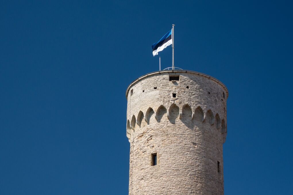 Brick tower with the Estonian flag