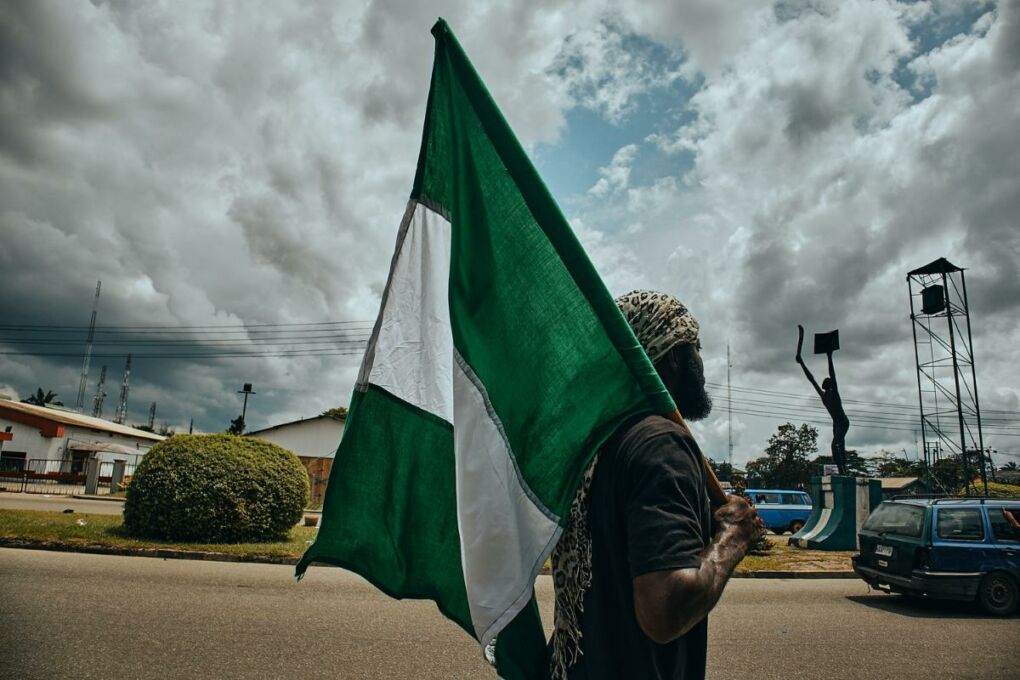 Man holding Nigerian flag