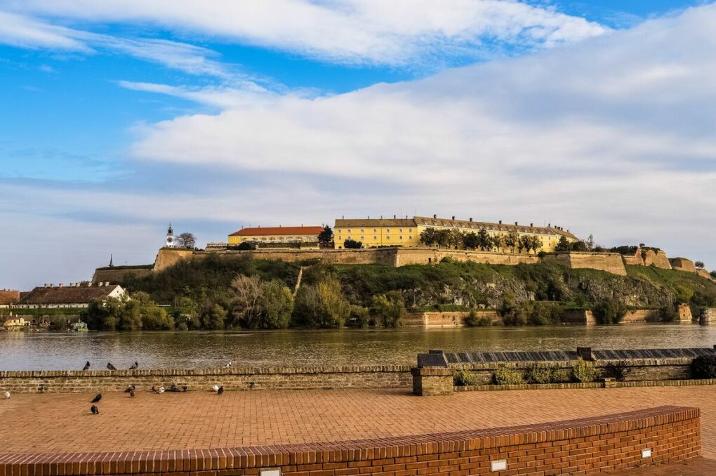 Wide shot of Petrovaradin Fortress across Danube River in the city of Novi Sad