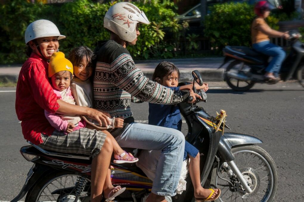 people on scooter in bali