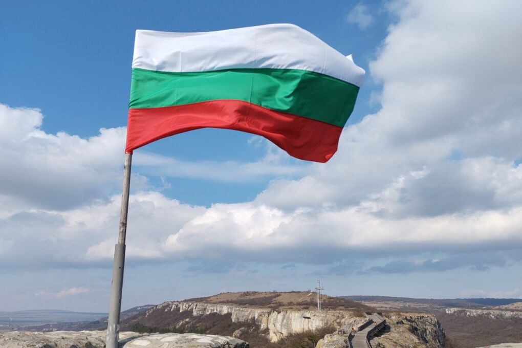 Bulgarian flag on the flagpole blowing in the wind