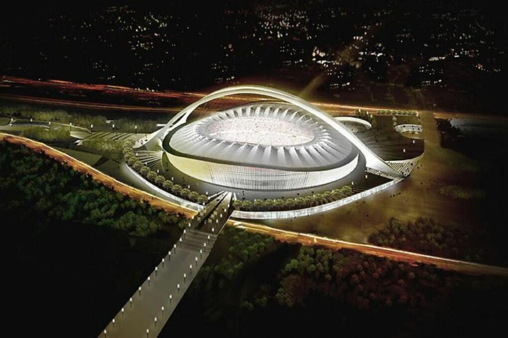 Moses Mabhida Stadium at night.