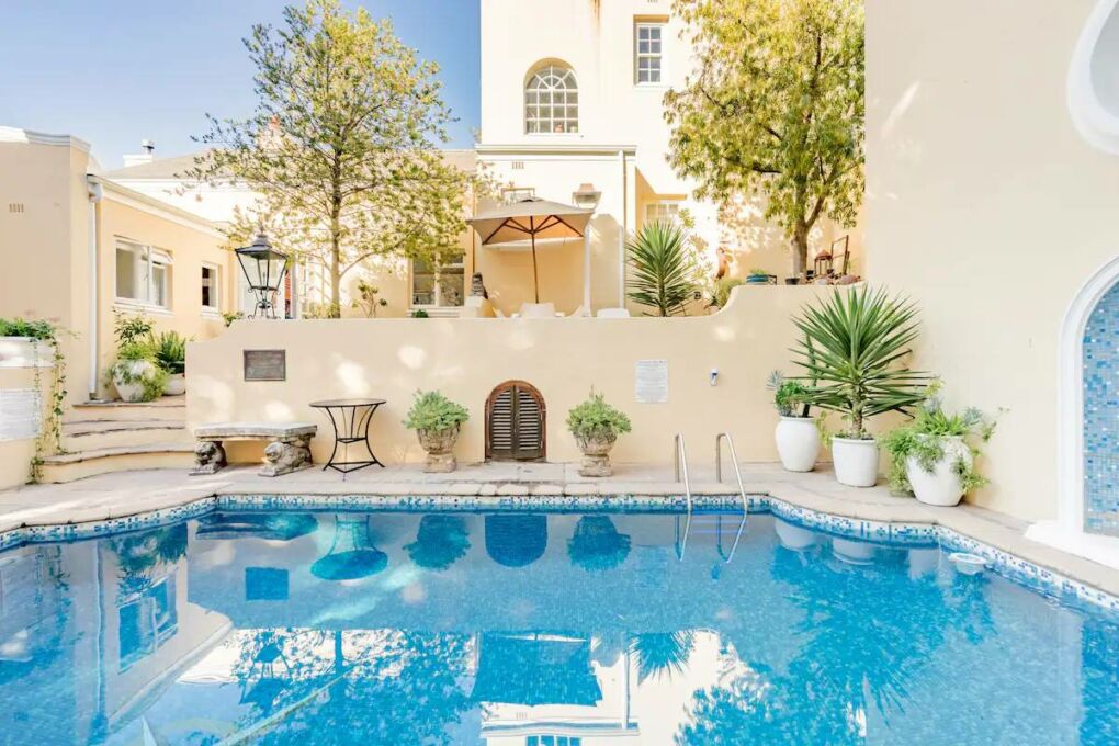 Pool and patio of a historic house in Sea Point