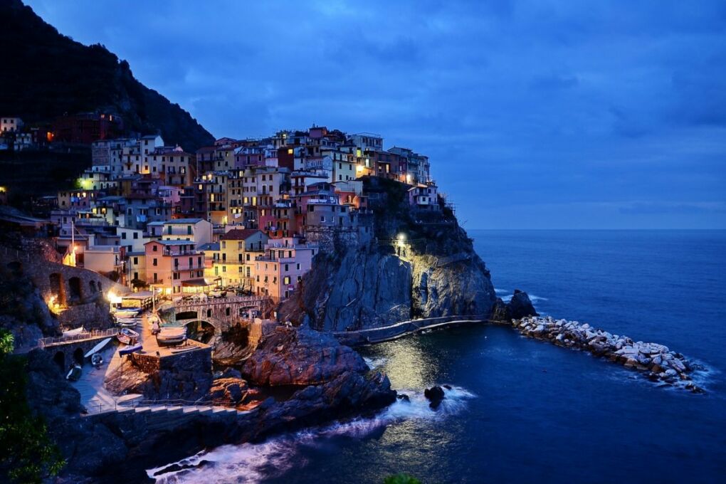 alt= "image of Italian village at night"