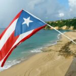 Puerto Rican Flag Hanging Over a Beach.