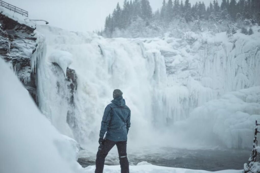 Image-of-a-snow-fall-with-man-watching