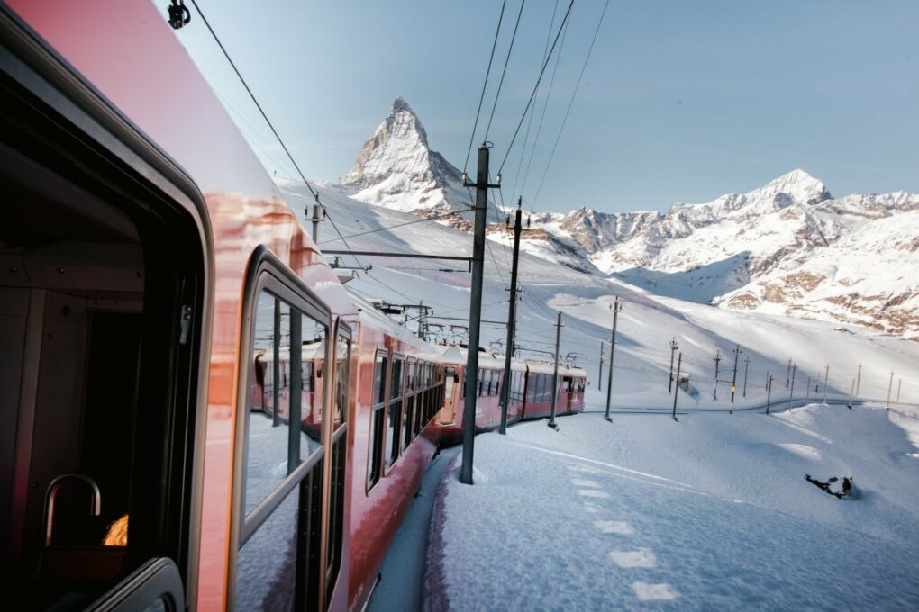 Image-of-red-swiss-train-on-mountains
