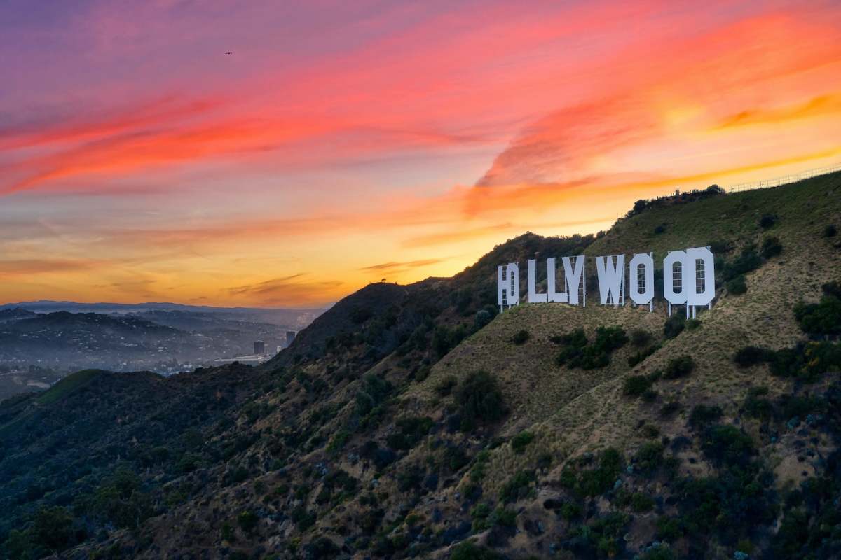 A pink sunset over the Hollywood sign in the United States