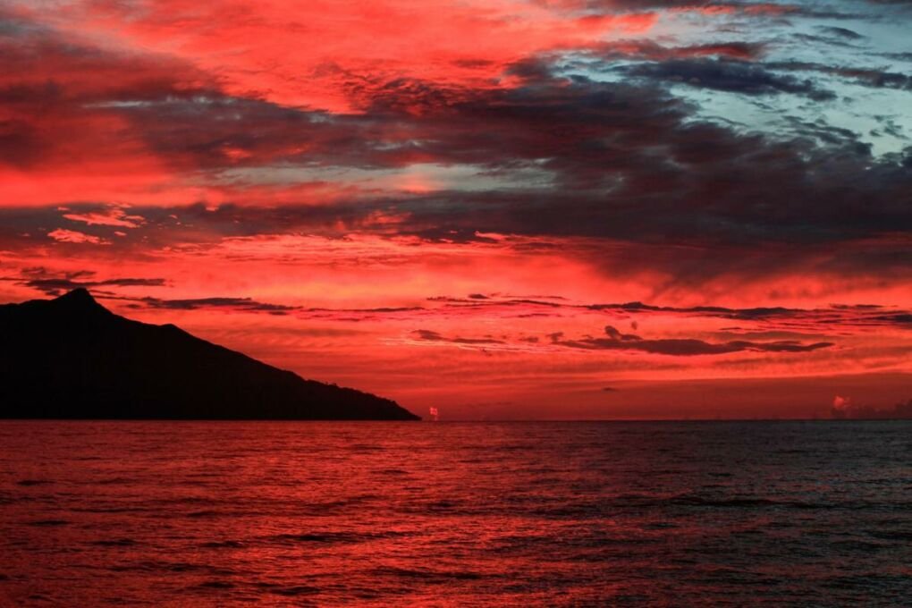 A gorgeous orange sunset over Milne Point waters