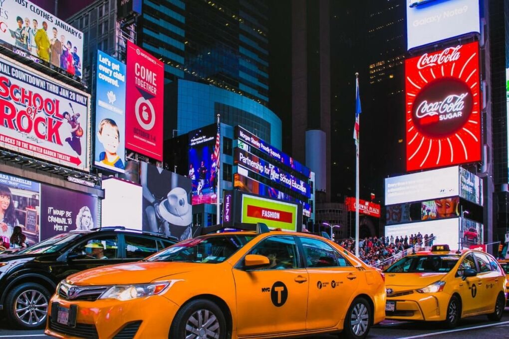 A taxi driving through New York City