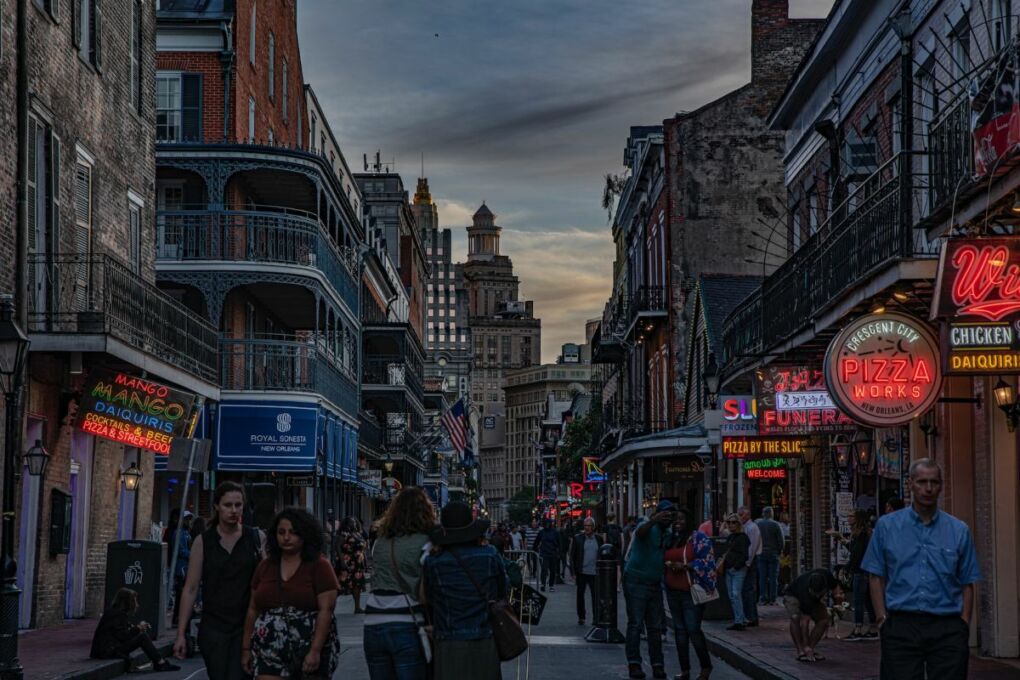People walking on a busy street in New Orleans
