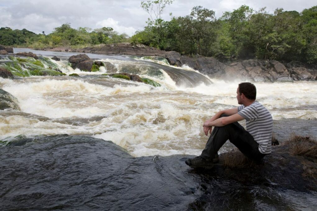 Tourist at a river in Suriname