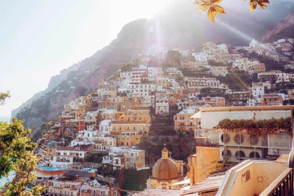 Houses in Italy's Amalfi|Shoreline in Amalfi|Amalfi Coast cliffs|Amalfi beach|aerial view of buildings in Amalfi