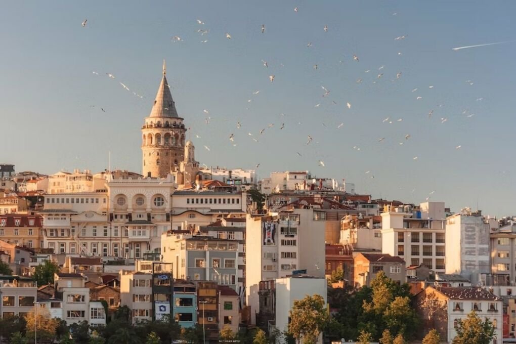 |Image-of-concrete-buildings-near-water|Black_and_white_image_of_person-standing_on_Turkey_bridge|red-Turkish-flag|Image-of-blue-lara-beach-water|Image-of-people-outside-a-turkish-mosque|Hot-air-balloon-in-Turkey|image-of-white-stone-buildings-in-turkey|Image-of-boat-on-still-water-in-Turkey|image-of-buildings-next-to-calm-body-of-water