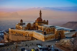 ishak-pasha-palace-in-armenia|an-old-brick-tunnel-with-a-wagon-in-it|blue-sea-near-brown-mountain-under-blue-sky-during-daytime|brown-and-blue-concrete-building|brown-concrete-building-on-green-grass-field-during-daytime|building-surrounded-with-trees|grassy-field-with-mountains-in-the-background|haghartsin-monastery-in-armenia|stone-building-with-a-steeple-on-top-of-it|view-of-city-buildings-during-daytime|water-surrounded-by-a-forest